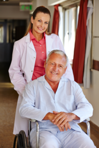 doctor and elderly man smiling